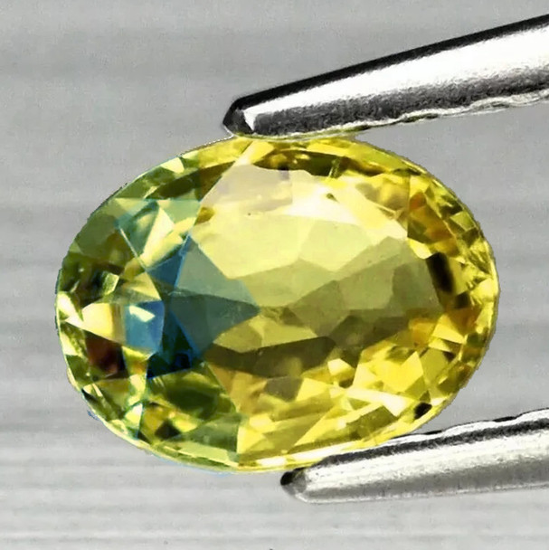 7x5 mm Oval 0.85ct AAA Luster Natural Madagascar Yellowish Green Sapphire [VVS-VS]