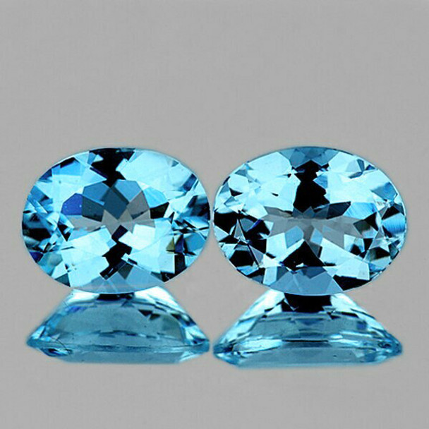 9x7 mm Oval 2 pieces AAA Fire Luster Natural Intense Sky Blue Topaz [Flawless-VVS]