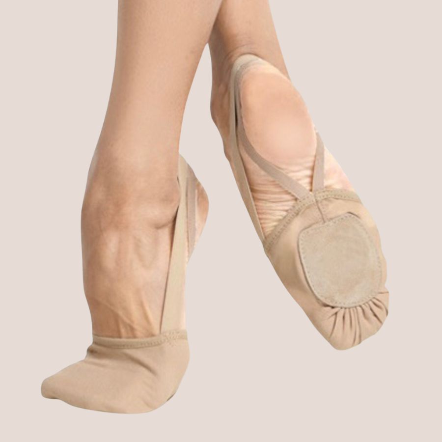 Tan lyrical half sole shoes on pointed feet