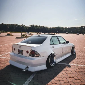 Complete Styling Kit: JDM GR Style Front Bumper Lip & 4-Piece Window Visors For 2001-2005 Lexus IS300 Sedan