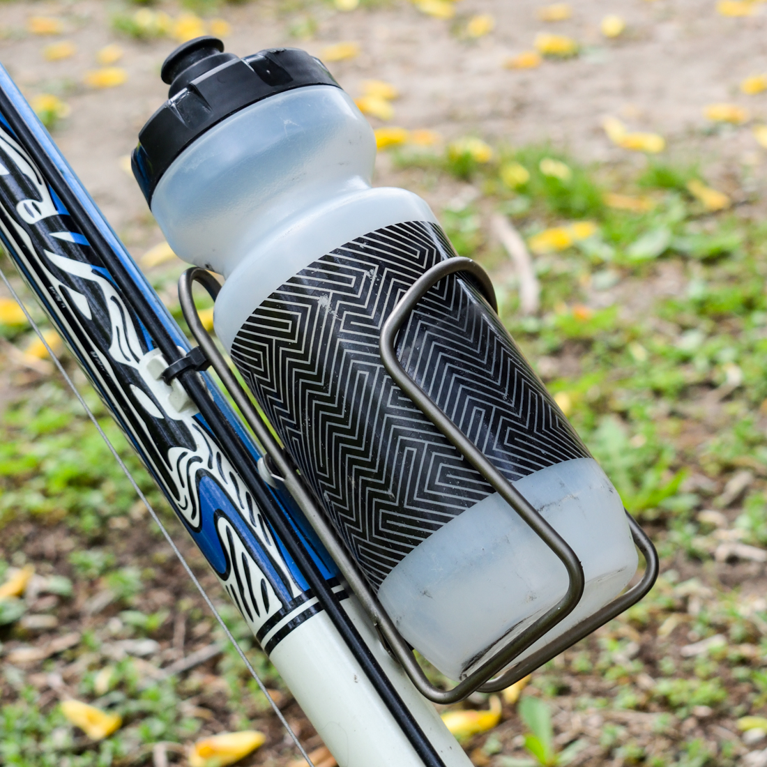 Water bottle holder for shop bicycle