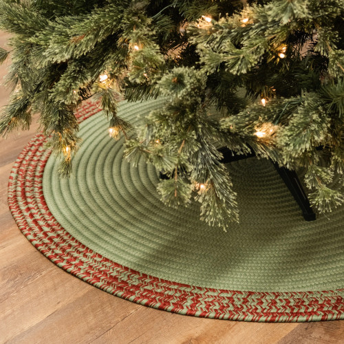 Green Colonial Mills Bordered Under-Tree Christmas Reversible Round Rug. USA Made round braided holiday rugs by Colonial Mills for Indoor / Outdoor use