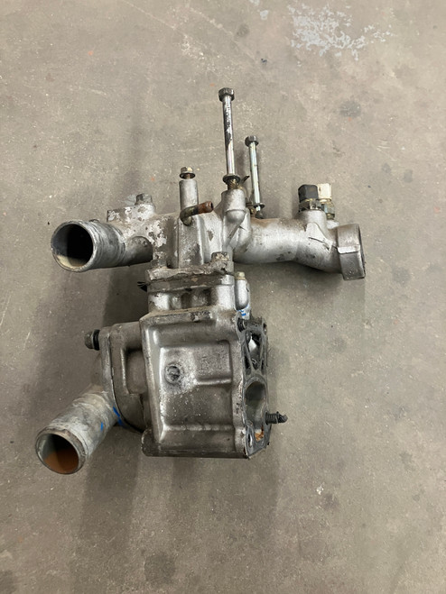 USED - MONTERO Gen2  3.5L DOHC -  Thermostat Housing Assembly