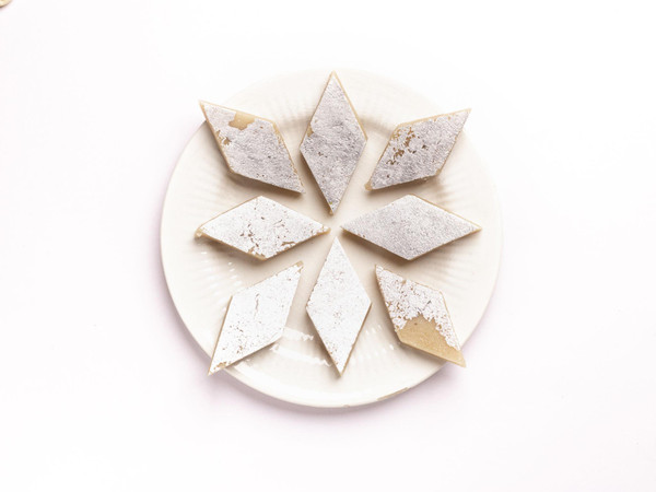 Buy authentic Kaju Katli online. Classic Indian cashew sweet crafted for celebrations, weddings, and festive gifting.