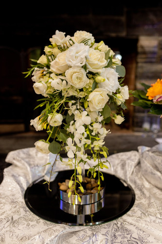 Cascading elegance of traditional whites with a touch of green and sparkly gems.