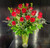 Two dozen spectacularly gorgeous red roses delivered in a dazzling flared glass vase - positive proof that love is a many-splendored thing. Imagine her loving this amazing bouquet day after day. 