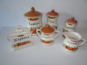 Set of 6 retro Webb Japan fruit festival,  pottery cannisters circa 1960s in lovely colour shades.  Not only do they look good they can also be used to brighten up your kitchen space.