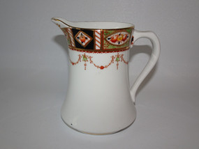 Shore and Coggins Imari pattern milk jug with swags of garlands dated 1920-1930