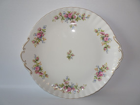 Vintage Royal Albert Moss Rose cake plate circa 1960s with pink floral sprays, gold trim and shaped handles.