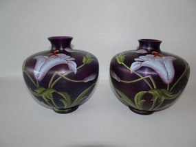 Stunning pair of iridescent purple glass vases Buchenau  glasswords with hand painted enamelled lillies by Ferdinand von Poschinger dated circa 1900.