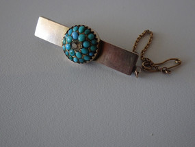 Victorian rolled gold brooch with central diamond and turquoise cluster, 4 cm long