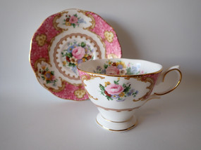 Royal Albert Lady Carlyle pink floral teacup and saucer with gold trim dated 2003