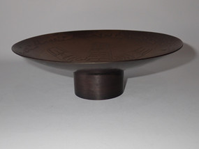 Signed Harold Alfred hand-hammered solid copper pedestal dish featuring a traditional stylised Sun design.