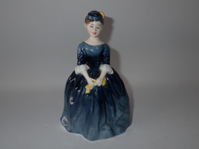 Royal Doulton Cherie HN2341 figurine in a flowing blue gown designed by Margaret Davies.