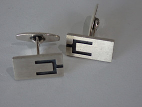 Mid-century Scandinavian sterling silver cufflinks by N.E. From with brushed rectangular faces and maker's mark.