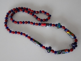 Vintage Murano Venetian millefiori glass bead necklace with colourful feature beads and red and cobalt-blue glass beads.