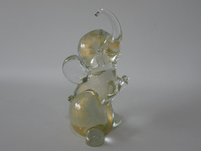 Vintage Murano handblown glass elephant figurine with raised trunk and shimmering 24K gold leaf inclusions, 17 cm tall.