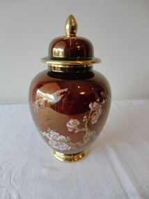 Carlton Ware Rouge Royale tea caddy with bird of paradise decoration and gilt lid circa 1930s
