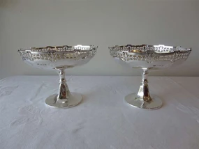 Pair of Scottish sterling silver pedestal comports by Hamilton & Inches circa 1926 with decorative pierced borders.
