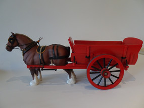 Vintage Beswick shire horse in full harness and cart.