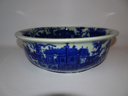 Rare early 19th century English flow blue bowl with town scene, minor makrs to inside of bowl.