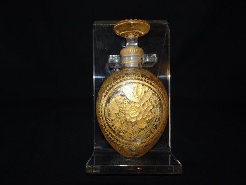 Rare 20th century glass travelling flask with etched and gilt flowers, grapevine and fruite motigs with large stopper, engraved John Burton California to base.  This stunning piece comes with custom made stand.