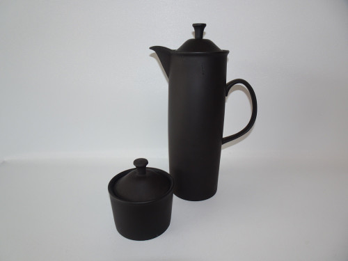 Lovely rare mid century Wedgwood black basalt coffee pot and sugar designed by famour Robert Minkin.