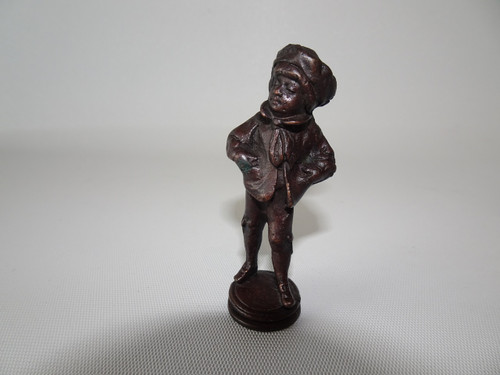 Introducing the exquisite bronze wax seal featuring a Victorian boy with hands in his pockets beautifully incised monogram from the 1900s.