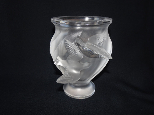 Vintage Lalique Rosine frosted crystal vase featuring sculpted birds in flight, flared rim and pedestal foot.