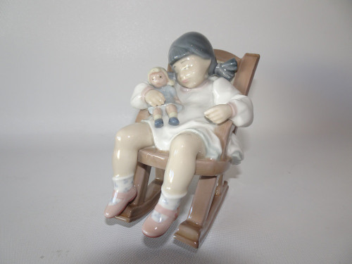 Lladro 5448 Naptime figurine by Jose Puche, porcelain girl with doll in rocking chair, 12cm tall