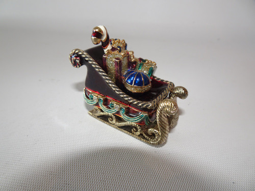 Monet Santa Sleigh enamel trinket box with gold and red detailing and miniature gifts inside