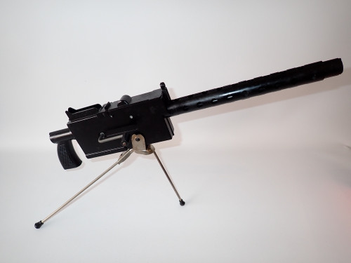 Vintage Mettoy cap-firing toy on tripod with original illustrated box