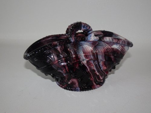 Antique malachite marbled slag glass basket vase with applied handle