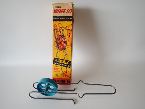 Vintage Whee-Lo magnetic walking wheel toy with original box c.1950s