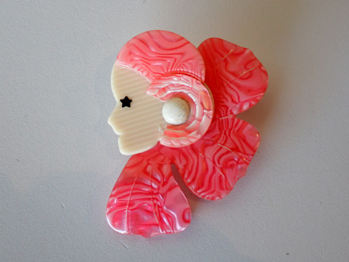 Vintage Lea Stein Paris Corolle girl brooch in pink and fuchsia swirls with cream face and black star eye