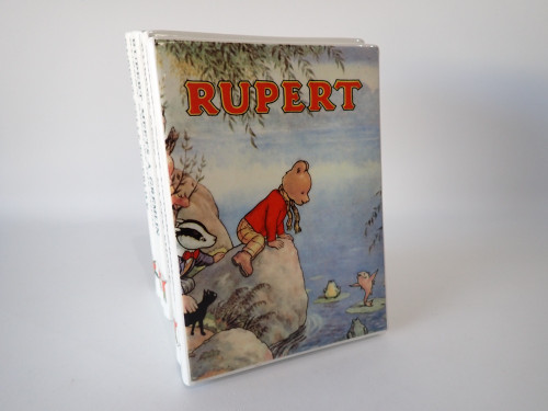 Vintage Wedgwood Rupert Bear money box designed as a stack of Rupert Bear books