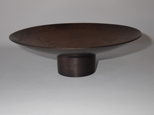 Signed Harold Alfred hand-hammered solid copper pedestal dish featuring a traditional stylised Sun design.