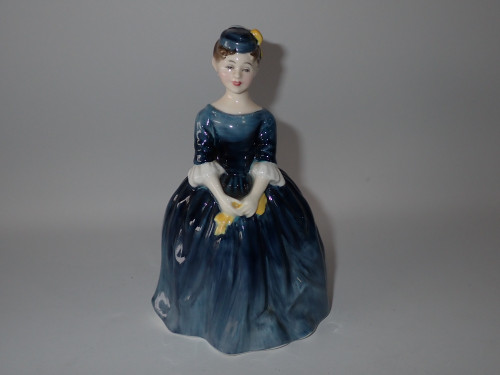 Royal Doulton Cherie HN2341 figurine in a flowing blue gown designed by Margaret Davies.