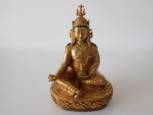 Circa 1900 Chinese gilt bronze Buddhist figure with elaborate crown, jewelled robes and decorative lotus base.