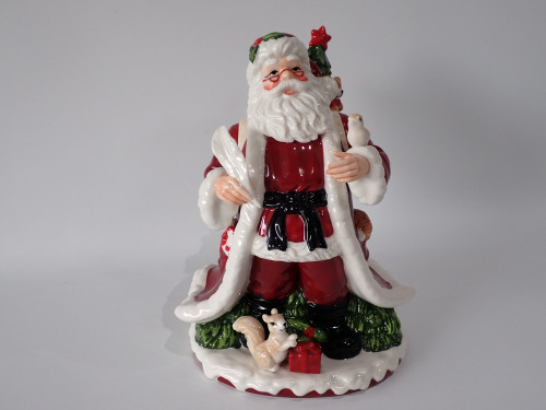 Johnson Brothers 'Twas The Night ceramic Santa Claus figurine holding a quill, with a squirrel and Christmas present at his feet.