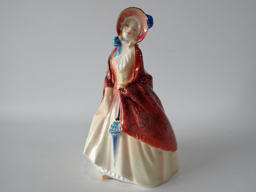 Royal Doulton Paisley Shawl HN 1988 bone china lady figurine wearing a red patterned shawl, ivory gown and bonnet, 16cm tall.