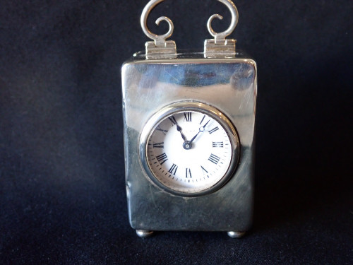 Antique William Comyns sterling silver carriage clock London 1903 with enamel Roman numeral dial