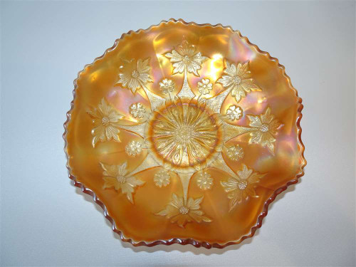 Antique Fenton apricot carnival glass Little Flowers bowl with embossed floral decoration, golden iridescence and finely crimped rim.
