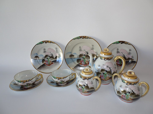 Japanese Kutani 10 piece tea set for two dated 1868-1913.