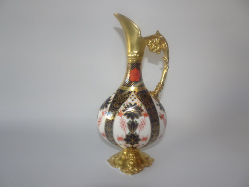 Royal Crown Derby Imari 1128 swan neck ewer circa dated 1973, in colours of iron red, cobalt blue and gold.