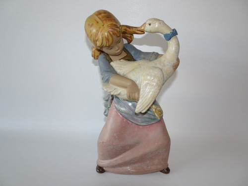 Vintage retired Lladro in gres finish, goose  pulling girl's pigtail