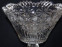 Rare large antique cut crystal pedestal bowl with sawtooth rim, Russian pattern band over vertical cuts with a twist knop stem on a circular foot star cut base.