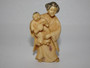 Japanese ivory netsuke woman and child, signed.