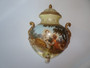 Vintage seto ceramic wall fountain with lid and spout decorated with an 18th century garden love scene