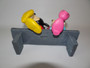 Disney Mickey and Minnie Mouse in love in love sitting on a bench, made from polyresin material circa 1990s